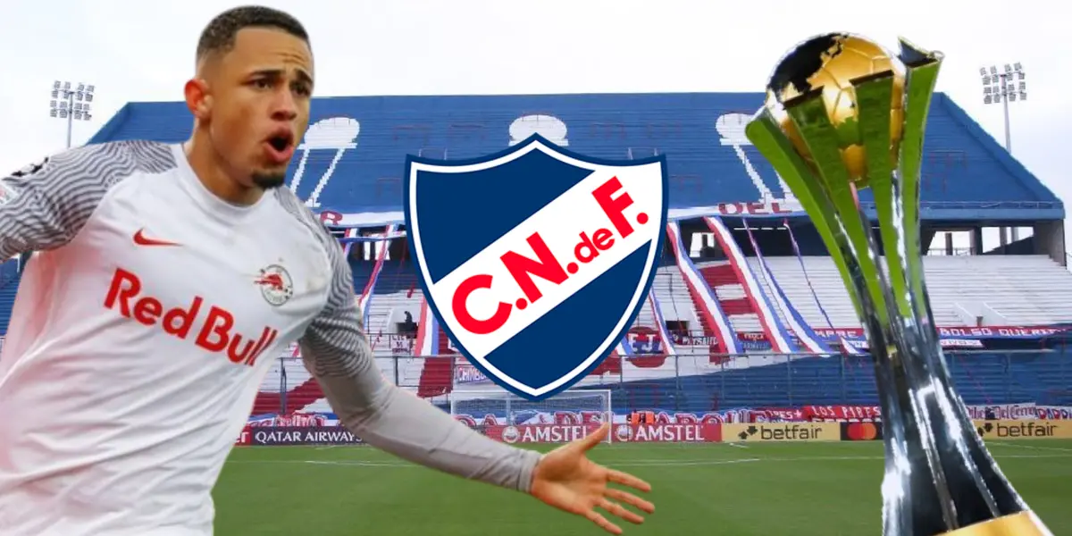 Noah Okafor de Red Bull Salzburgo con el escudo de Nacional y el trofeo del Mundial de Clubes